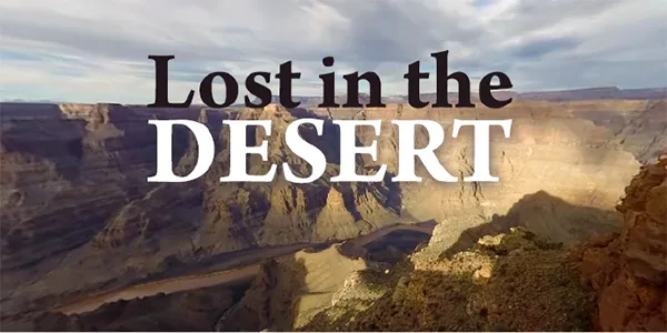 3D Graphics of a desert canyon and text logo reading "Lost in the Desert" on REAL i-Series