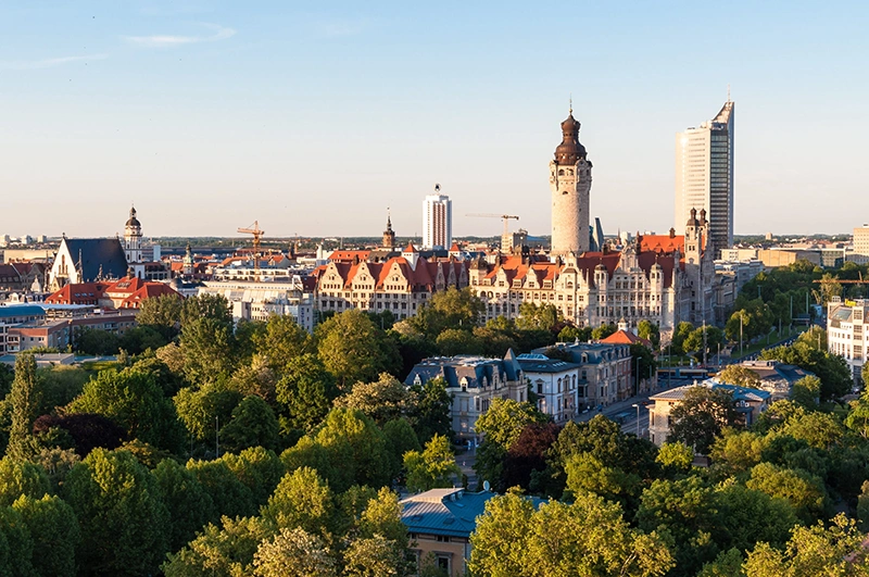 Skyline of Leipzig with townhall at sunset, Germany