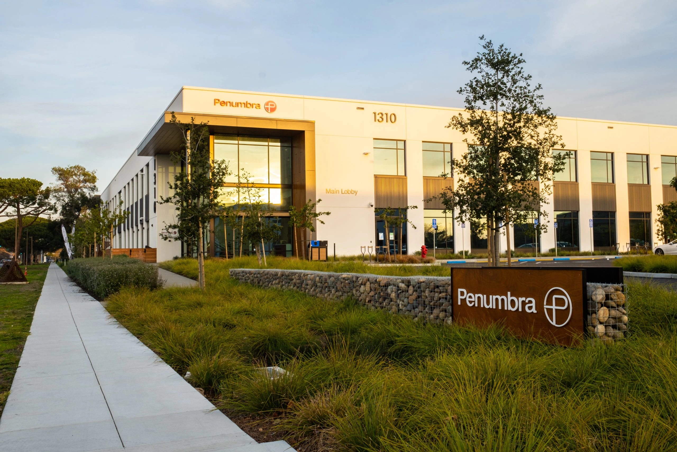 Penumbra P on the Penumbra HQ with an Outdoor sign with Penumbra P Logo