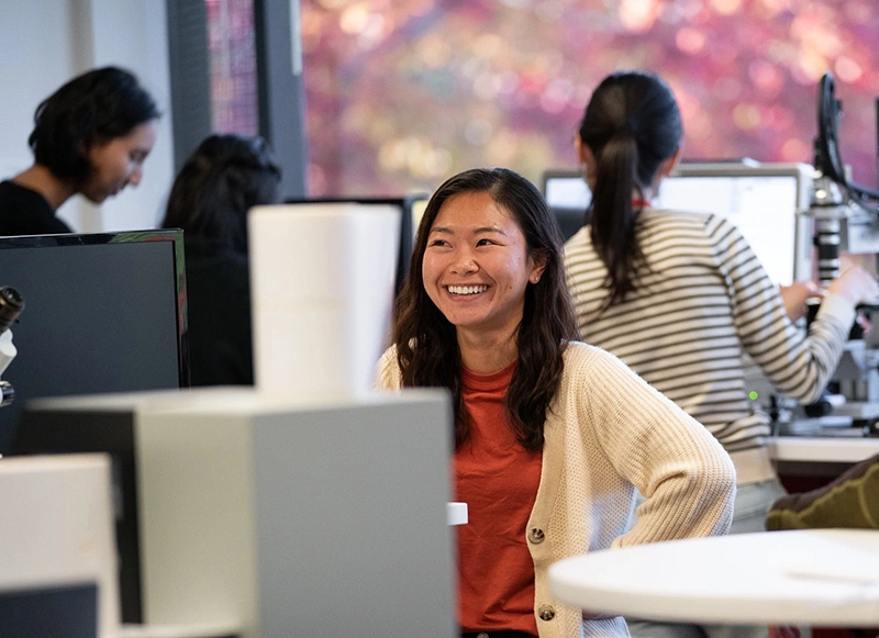 Woman laughing at joke in engineering department