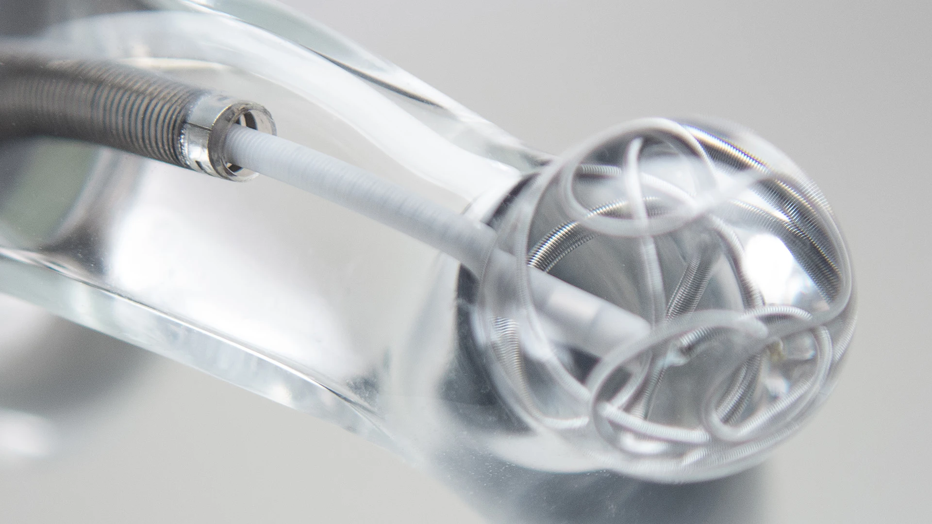MIDWAY 62 Coil Deployment in Glass Tube
