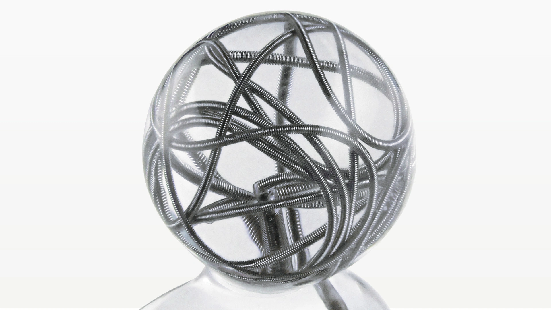 PC400 framing a model aneurysm in clear, spherical flow model
