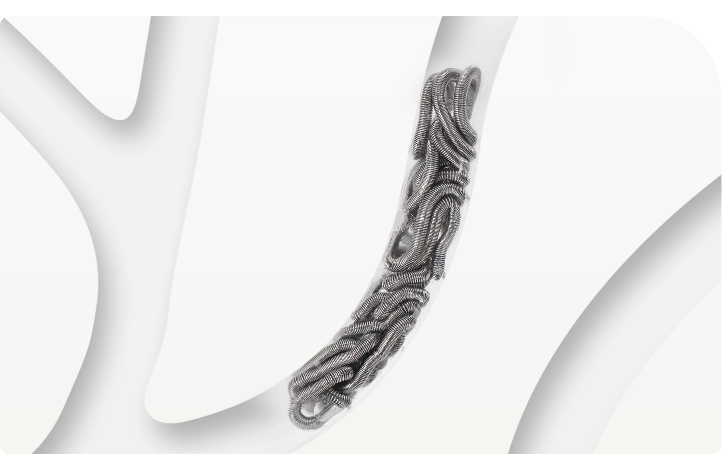 Embolization Coils in a glass tube model on a white background