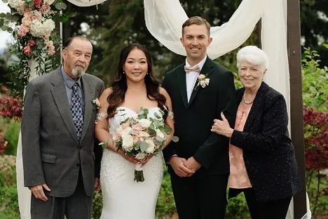 Wedding photo of Tyler Cobb, his wife Lucy, and his grandparents, Ed and Cindy.