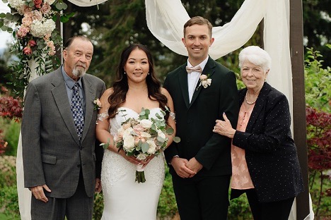 Wedding photo of Tyler Cobb, his wife Lucy, and his grandparents, Ed and Cindy.
