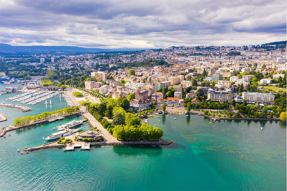 image of aerial view from lake Geneva of Swiss town of Lausanne